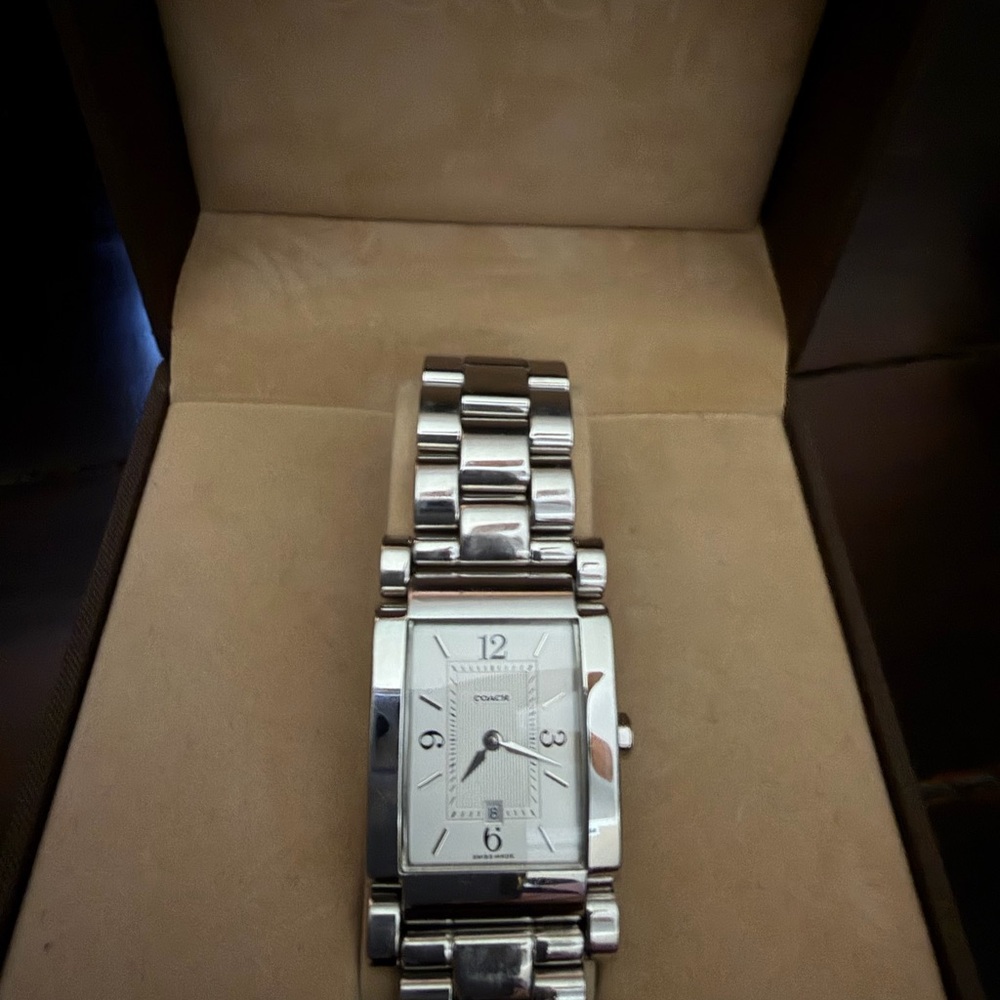 Coach watch - great condition. Very light scratches on band. Extra clasp.